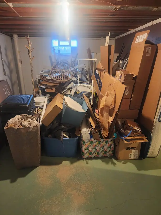 Roll-off dumpster container at job site for 2 Yard Dumpster Rental in Smithville-Sanders